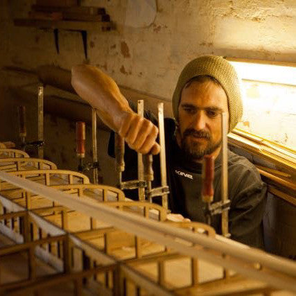 Sealand Gear Ambassador Patrick Burnett Shaping a Board