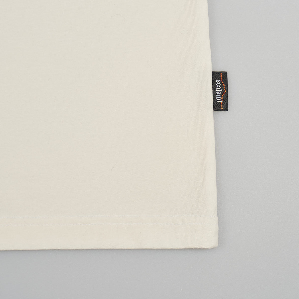 Sealand men's oversized boxy tee in pure white BCI cotton with sleeve branding