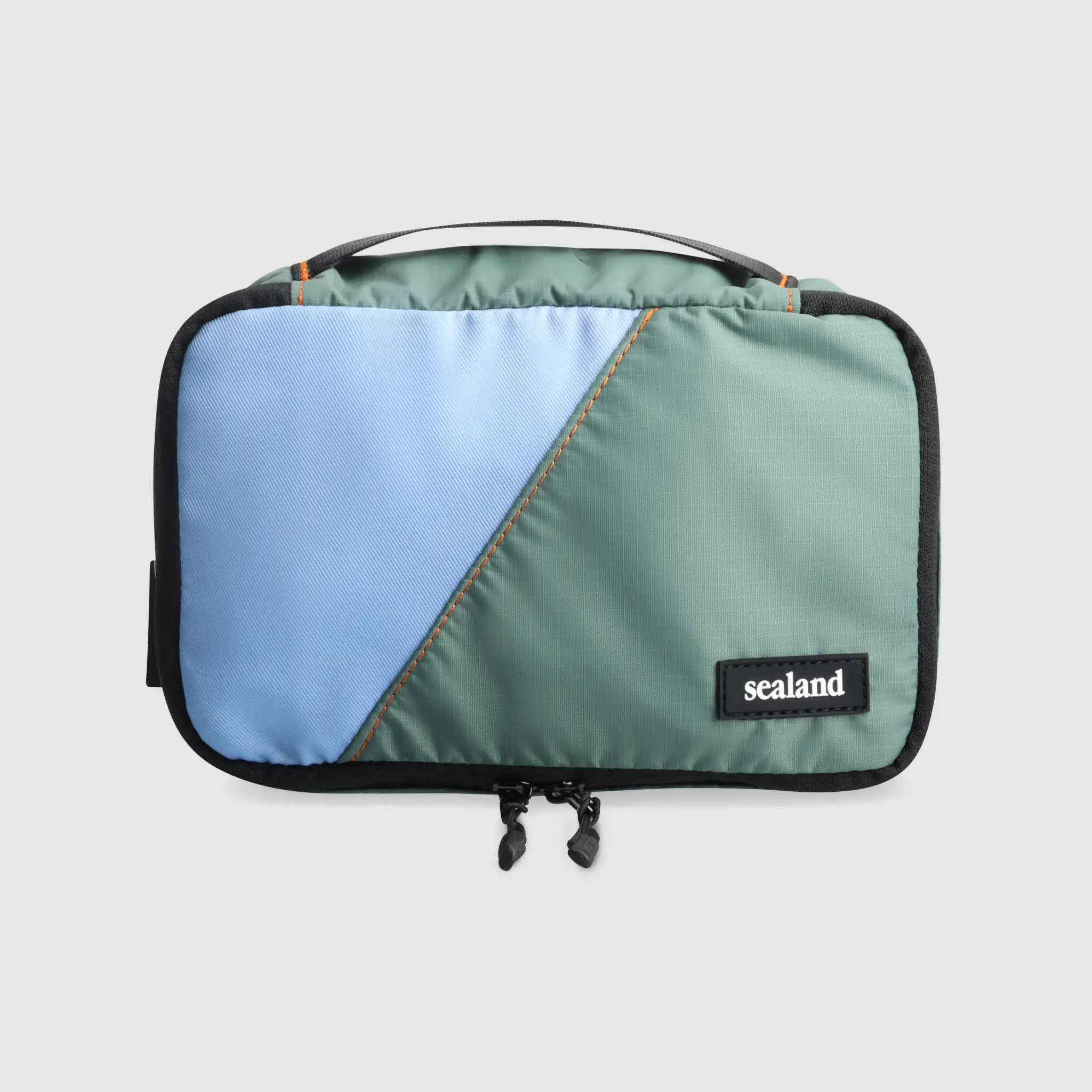 Sealand Packing Cube - Two-toned green and blue bag with 'sealand' branding