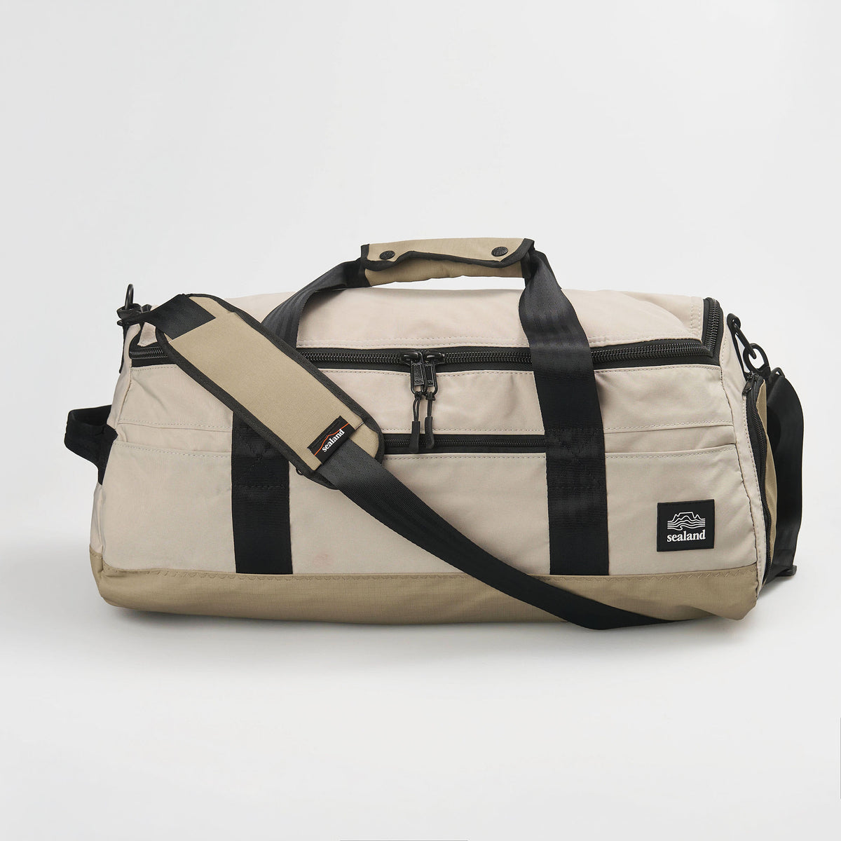 Sealand Dune travel duffel bag in 100% recycled MajiTex with end shoe compartment in Stone