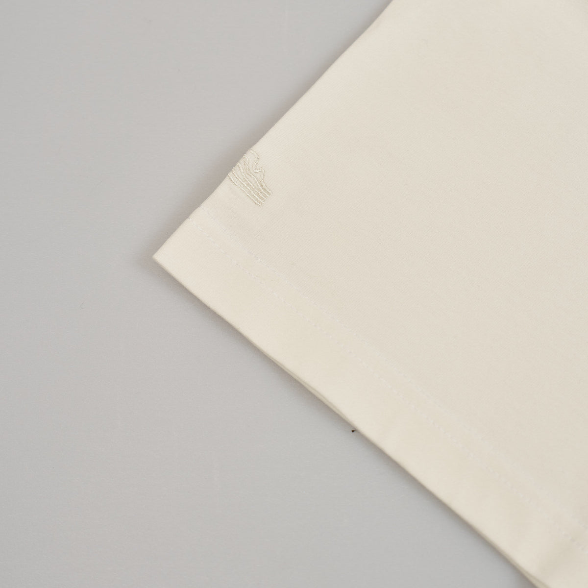 Sealand men's oversized boxy tee in pure white BCI cotton with sleeve branding