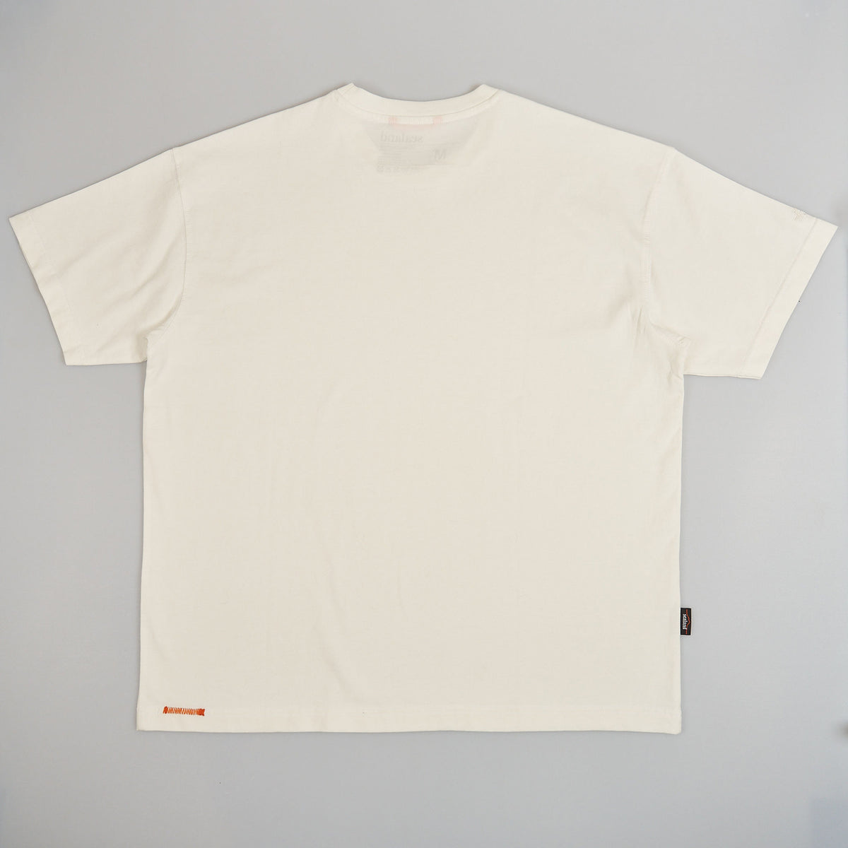 Sealand men's oversized boxy tee in pure white BCI cotton with sleeve branding