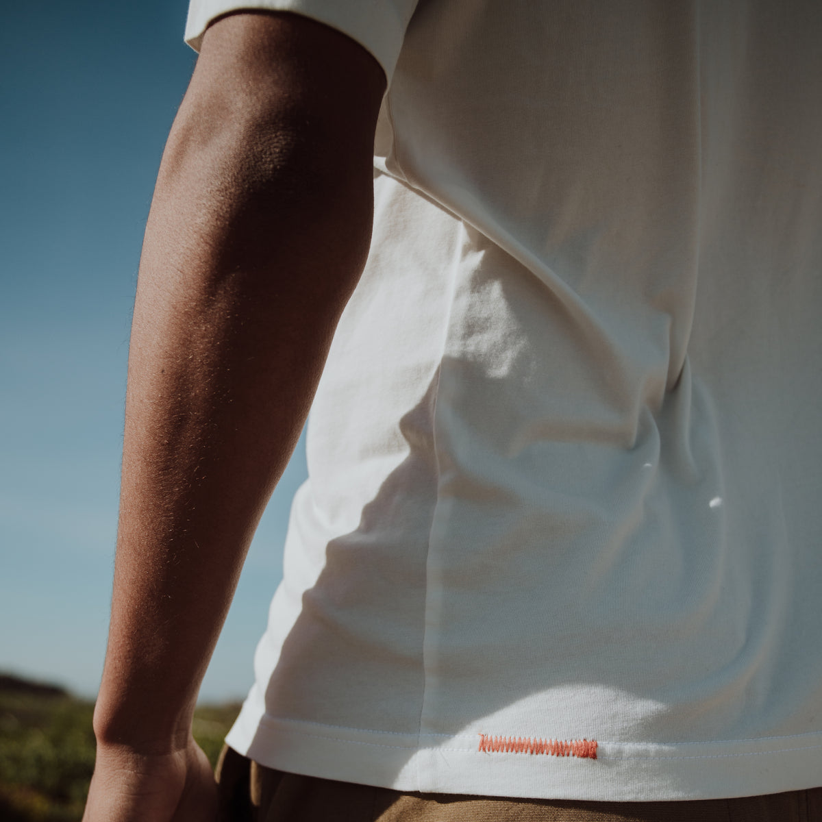 Sealand men's oversized boxy tee in pure white BCI cotton with sleeve branding